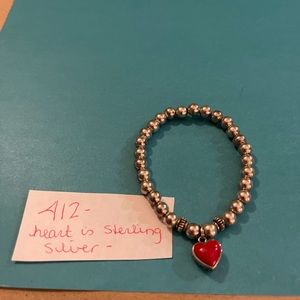 Silver bracelet with sterling silver red heart charm